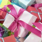 Gifts - Close-up Photo of Assorted-colored Gift Boxes