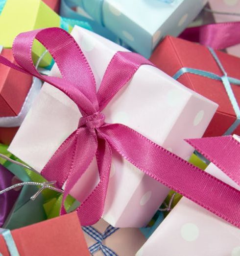 Gifts - Close-up Photo of Assorted-colored Gift Boxes