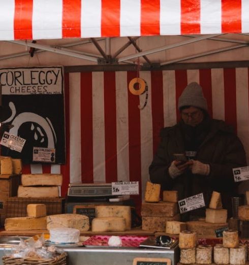 Artisan Markets - Man at Stall in Town