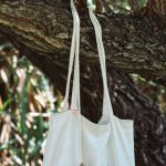 Camping Gear - Cotton Bags Hanging on Branch