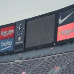 Sports Brands - Signage in Stadium Under White Sky