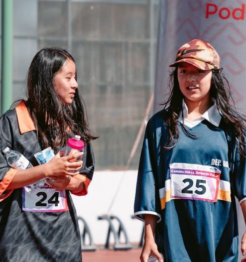 Team Jerseys - Women Walking with Race Numbers