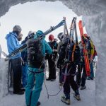 Ski Equipment - People in a Frozen Cave