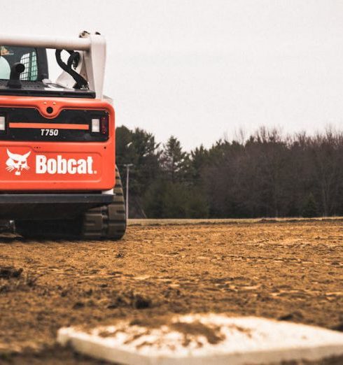 Team Sports Equipment - Skid Loader on a Baseball Field