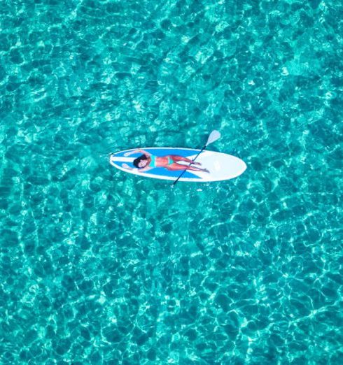 Water Sports Equipment - Woman on a Paddleboard