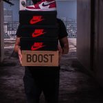 New Brands - Person Carries Boxes of Shoes