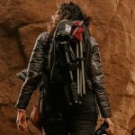 Hiking Gear - Woman in a Rocky Cave