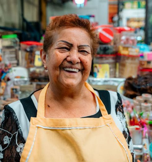 Women’s Sporting Goods - Smiling Woman Selling on Market