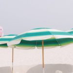 Family Activities - Striped Umbrellas on a Sandy Beach