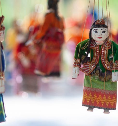 Asian Markets - Traditional Handmade Puppets Hanging on Strings