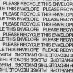 Sustainable Materials - Close-up of Lines of Text Saying "Please Recycle This Envelope"