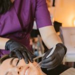 Customer Retention - Woman Getting a Facial Treatment Done by a Beautician