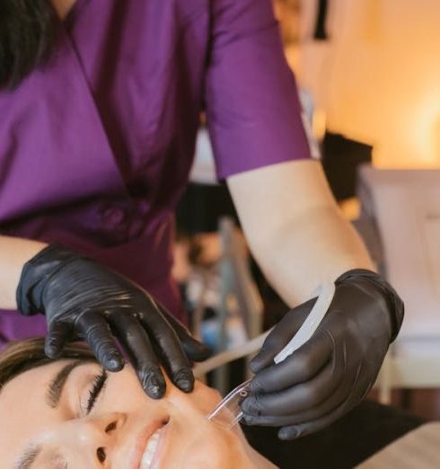 Customer Retention - Woman Getting a Facial Treatment Done by a Beautician