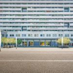 Real Estate Flipping - Contemporary building facade in Dresden, Germany on a sunny day.