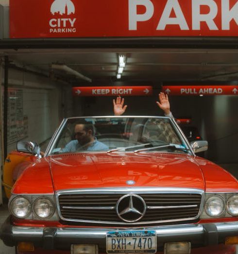 Exit Interview - Red Convertible on Parking Driveway