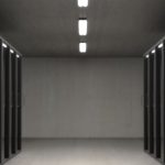 Data - Spacious data center with aligned server racks and LED indicators.