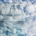 Transparency - Bottom View of Clear Glass Building Under Blue Cloudy Sky during Day Time