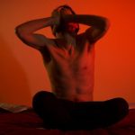 Mental Health - Topless Man Sitting on the Bed