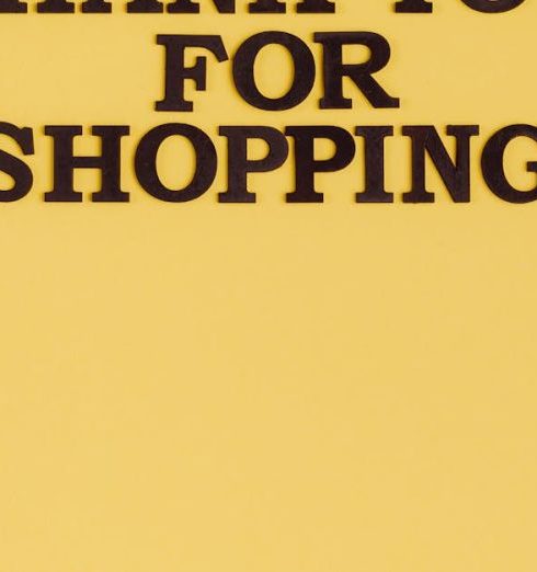 Customer Journey - Bold black text 'Thank You for Shopping' on a vibrant yellow background, offering clear copyspace.