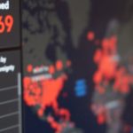 Data Dashboard - Screen displaying real-time COVID-19 case data with global map and statistics.