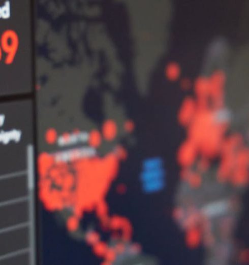 Data Dashboard - Screen displaying real-time COVID-19 case data with global map and statistics.