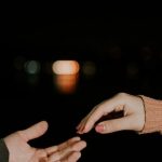 Joint Ventures - Close-up of a Couples Hands