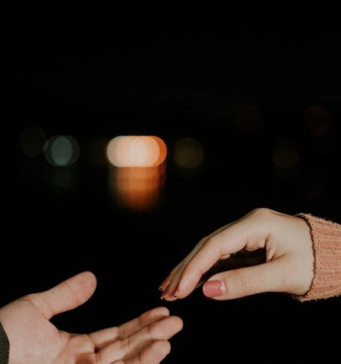 Joint Ventures - Close-up of a Couples Hands