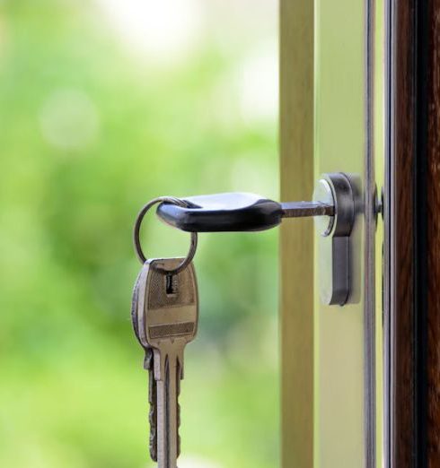 Home Security - Black Handled Key on Key Hole