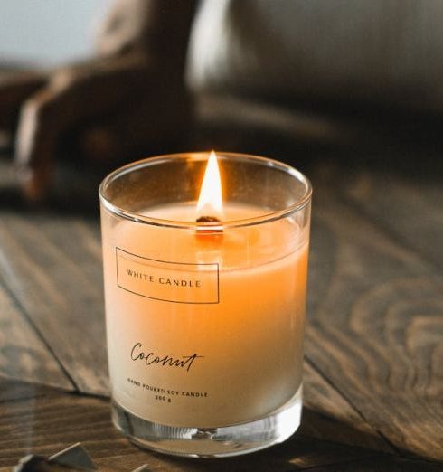 Fire Tables - Crop black woman standing at table with aromatic palo santo stick