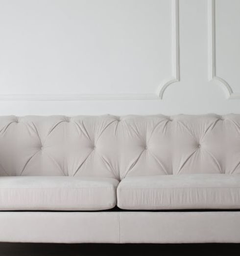 Sofa - Photo Of White Couch On Wooden Floor