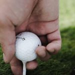 Outdoor Swings - Person Holding Golf Ball