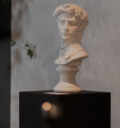 Room Plants - A stylish sculpture bust in a modern interior with plants and shelves.