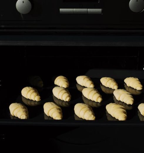 Convection Oven - Black Tray with Croissants Inside the Oven