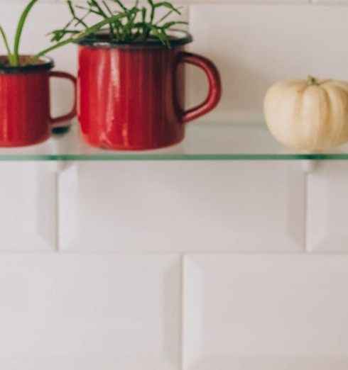 Cooking Utensils - Red Ceramic Mug on White Wooden Shelf