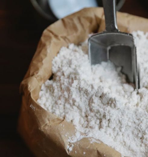 Pasta Tools - Flour in paper bag with steel scoop in kitchen