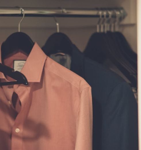 Closet - Close-up Photo of Hang Clothes in Wardrobe