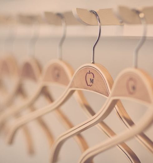 Wardrobe - Close-up of Clothes Hanging in Store