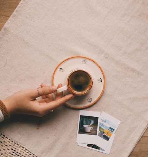 Warm Neutrals - Serene Coffee Moment with Polaroids on Table