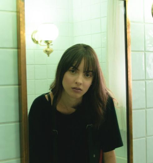 Bathroom Tiles - Woman in Black T-shirt Staring on Wall Mirror