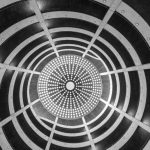 Heated Floors - A striking black and white view of a spiral architectural ceiling in Hamburg.