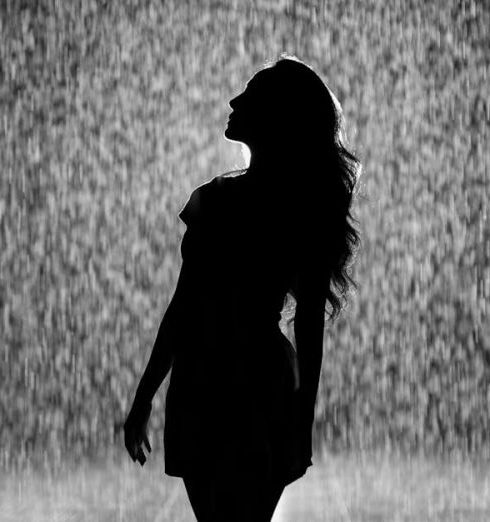 Rain Shower - Silhouette Of Woman Under Rain