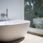 Bathtub - White Ceramic Bathtub Beside Clear Glass Wall