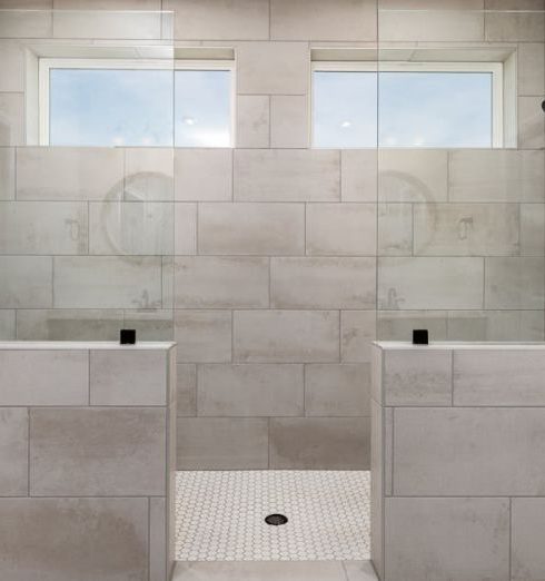 Dual Showerheads - Tiles and Showers in a Bathroom