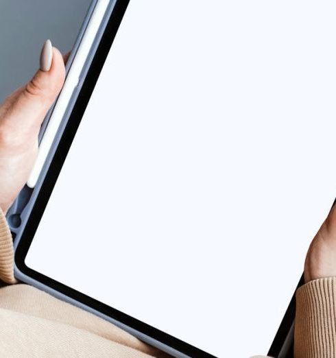 Smart Technology - Person Holding a Tablet