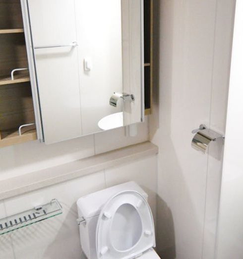 Small Bathroom - White Water Closet in Bathroom