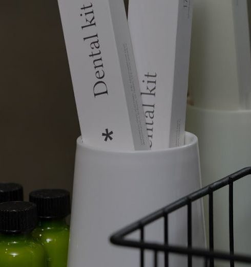 Guest Bathroom - Boxes of Toiletries and Lotion Bottles in Hotel Bathroom