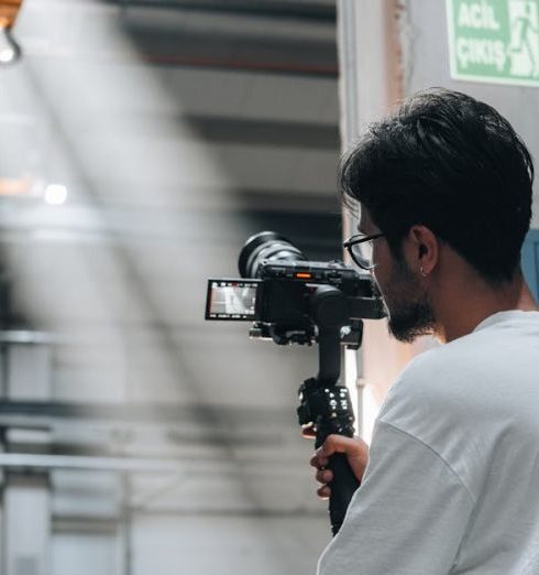 Motion-Sensor Lighting - a cameraman taking video