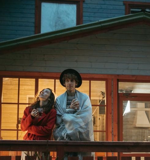 Backyard Security - Man and Woman Standing on Wooden Deck of a House