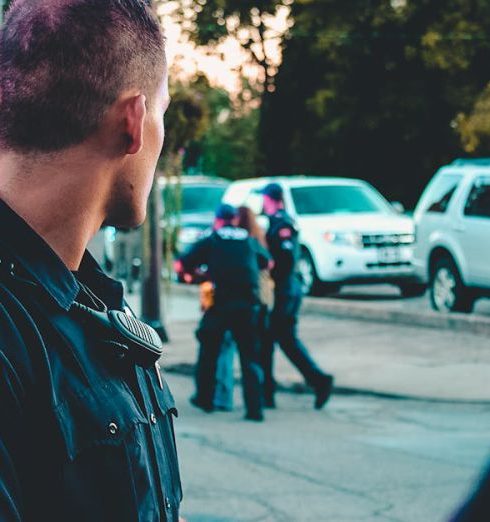 Neighborhood Watch - Man Wearing Black Officer Uniform