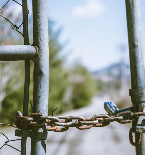 Access Control - Cyclone Fence in Shallow Photography